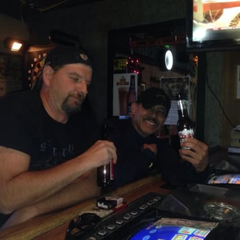 Hangar Bar - two men sitting at a bar drinking beer - Bars Near Me - Reno, Nevada