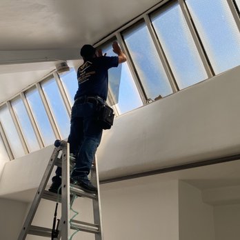 M&D Window Tint Services - M&D Window Tint Services installing tint & insulation on our ceiling. - Home Window Tinting Near Me