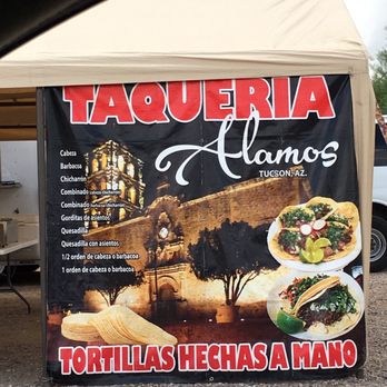 Taqueria Alamos - a taqueria sign in front of a tent - Food Trucks Near Me - Tucson, Arizona Taqueria Alamos - a taqueria sign in front of a tent - Food Trucks Near Me - Tucson, Arizona