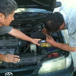 Kim's Shell Service - David & Roger changing my battery at my house!