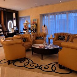 The Waldorf Astoria Spa - Showroom with makeup artist. You can wait here for your service complete with beverages and fruit.