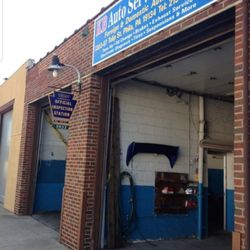 KB Auto Service Center - Infront of the shop