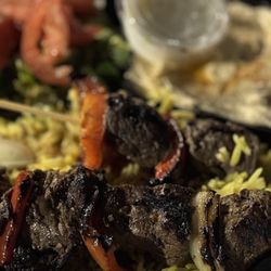 Princess Pita Mediterranean Restaurant - Tempe - Steak kabob, yellow rice, Greek Salad, Hummus, Garlic Sauce