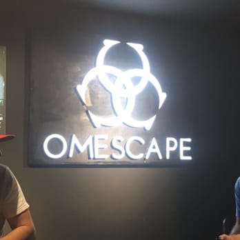 Omescape - Inside of the building this is the waiting room. They have mind testing puzzles to solve to warm up for the escape room. - Escape Games Near Me - London, XGL