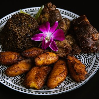 La Mulata - Roasted Pork with Congrí & Sweet Plantains
Slow-roasted, marinated pork seasoned with Cuban spices, served with traditional black beans and - Cuban Near Me - Lansing, Michigan La Mulata - Roasted Pork with Congrí & Sweet Plantains
Slow-roasted, marinated pork seasoned with Cuban spices, served with traditional black beans and - Cuban Near Me - Lansing, Michigan