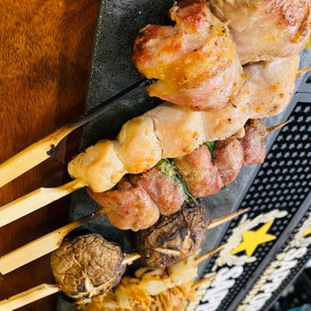 Susuru - Left to right: chicken oyster, sasami (chicken with wasabi), inner thigh with scallion, shiitake mushroom, baby scallop, kawa (chicken skin) - Izakaya Near Me - Orlando, Florida Susuru - Left to right: chicken oyster, sasami (chicken with wasabi), inner thigh with scallion, shiitake mushroom, baby scallop, kawa (chicken skin) - Izakaya Near Me - Orlando, Florida