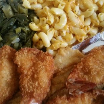 Soul Boat - P27: three pieces of whiting and four pieces of jumbo shrimp. The two sides are macaroni and cheese and collard greens. - Soul Food Near Me - Sicklerville, New Jersey Soul Boat - P27: three pieces of whiting and four pieces of jumbo shrimp. The two sides are macaroni and cheese and collard greens. - Soul Food Near Me - Sicklerville, New Jersey