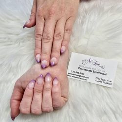 AiSpa & Nails - Get mesmerized by our pink to purple gradient nails! A touch of elegance awaits at AiSpa & Nails. #GradientGlam