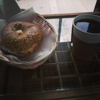 Lula Bagel - Whole wheat everything bagel toasted with veggie cream cheese and a small coffee. - Bagels Near Me - Brooklyn, New York