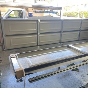 HT Garage Door - Installing new panels - Garage Door Services Near Me - Garden Grove, California