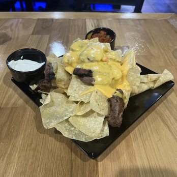 Tin Man - Steak nachos with hatch chili queso - Salad Near Me - Tarpon Springs, Florida Tin Man - Steak nachos with hatch chili queso - Salad Near Me - Tarpon Springs, Florida