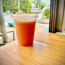 Alkaline Allie - Fresh pressed Spicy Allie. Red pear, apple, red pepper, and African bird pepper for a touch of spicy.