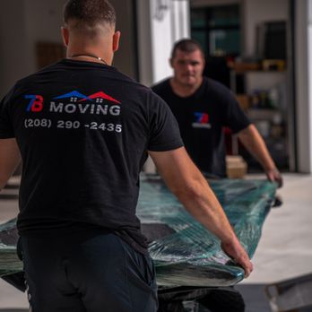 7B Moving - Dining room table being loaded onto a moving truck - Movers Near Me 7B Moving - Dining room table being loaded onto a moving truck - Movers Near Me