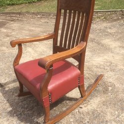 Very trim looking red leather seat on oak rocker