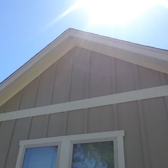 J&J Construction - the sun shining over the roof of a house - Roofing Near Me J&J Construction - the sun shining over the roof of a house - Roofing Near Me