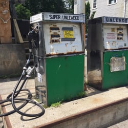 Currier's Quality Market - Old fashion fuel pumps still in operation