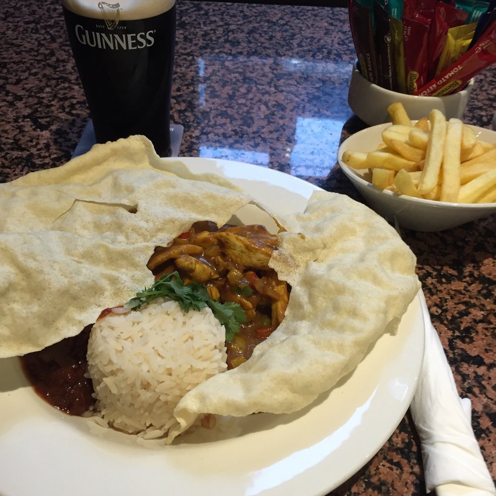 Caffrey's - Chicken curry with fries & a Guinness - Food Near Me