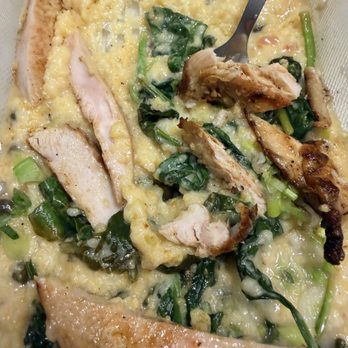 Juliet Italian Kitchen - Chicken Piccata with no capers, no lemon anything. Just polenta and some spinach with what I assume are green onions. - Italian Near Me - Austin, Texas