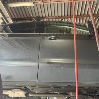 Midas - Dent on the lower curve of the passenger door - Oil Change Stations Near Me - Houston, Texas Midas - Dent on the lower curve of the passenger door - Oil Change Stations Near Me - Houston, Texas