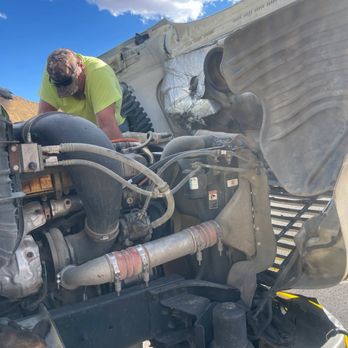 Anderson Roadside Assistance - Replacing a semi-blown radiator hose I-70 on spotted wolf - Roadside Assistance Near Me - Emery, Utah Anderson Roadside Assistance - Replacing a semi-blown radiator hose I-70 on spotted wolf - Roadside Assistance Near Me - Emery, Utah