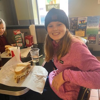 Primanti Bros. Restaurant and Bar - Karlea and her first Turkey Breast and Cheese! - Sandwiches Near Me - Pittsburgh, Pennsylvania