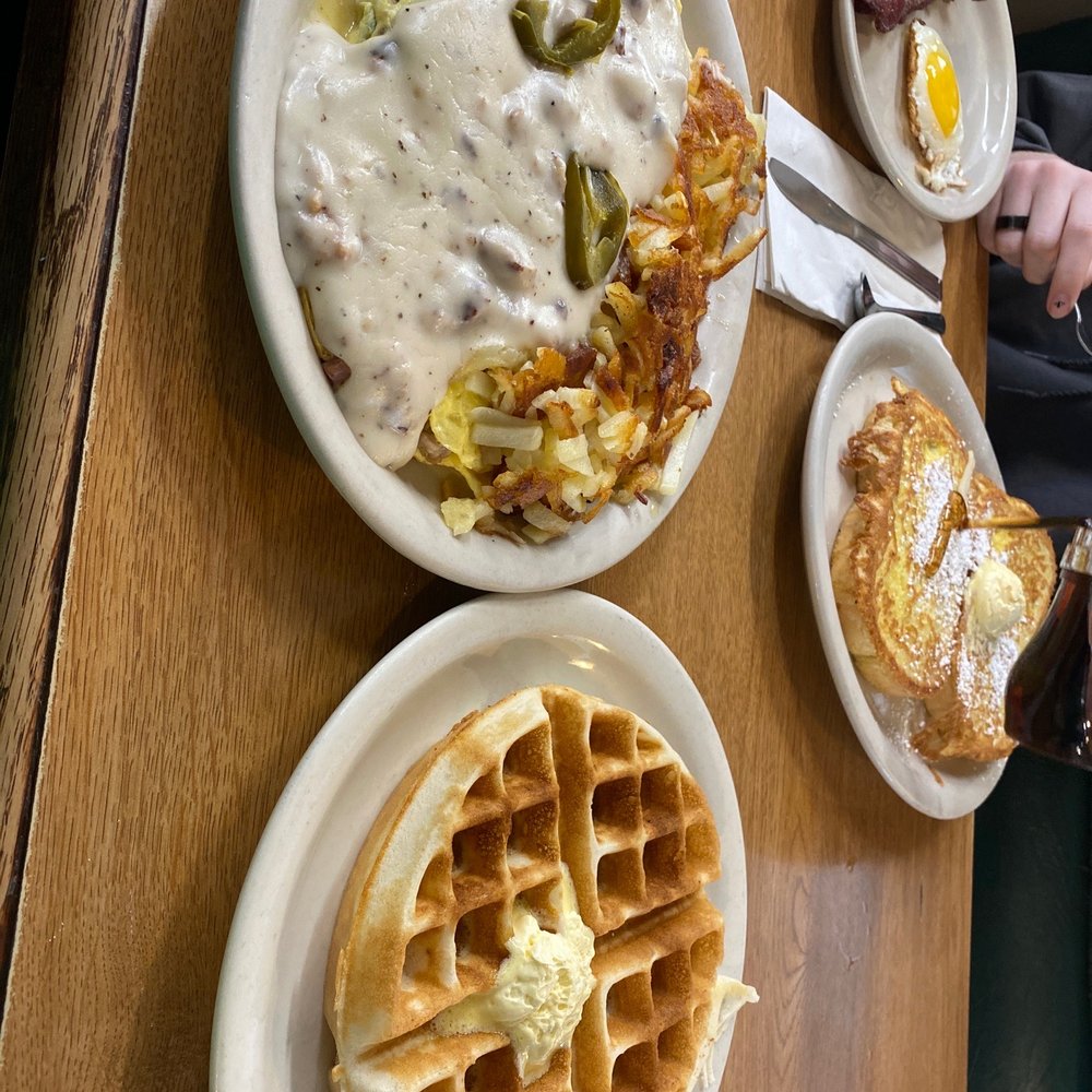 Waffles Caffe - two plates of food on a table - Breakfast & Brunch Near Me - Yakima, Washington