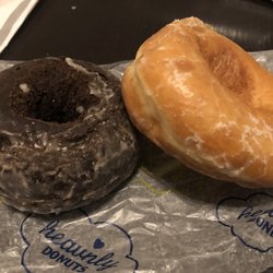 Chocolate cake and plain glazed donuts