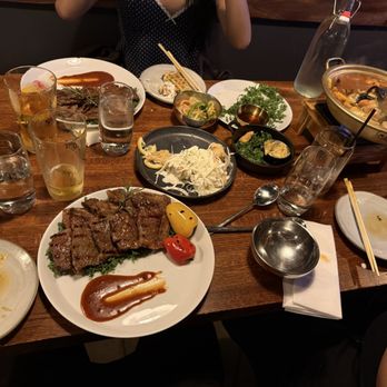 Anju - Kalbi short ribs, Sapporo's, and a seafood soup. - Korean Near Me - Charlotte, North Carolina Anju - Kalbi short ribs, Sapporo's, and a seafood soup. - Korean Near Me - Charlotte, North Carolina