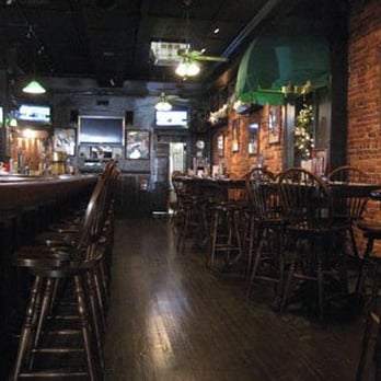 Downtown Lounge - a bar with wooden chairs and brick walls - Sports Bars Near Me - Lebanon, Pennsylvania