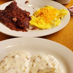 Velma's Diner - Biscuits and gravy scrambled eggs and cheese corn beef hash sausage and choose omelet home fries and coffee