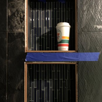 Definitive Home Improvements - a cup of coffee on a shelf - General Contractors Near Me - Deer Park, New York Definitive Home Improvements - a cup of coffee on a shelf - General Contractors Near Me - Deer Park, New York