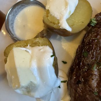 Martyrs - The sad baked potatoe.  So tiny - Steakhouses Near Me - Taos, New Mexico