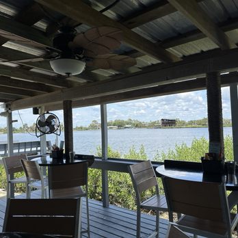 Peck's Old Port Cove - View from our table on the porch. - Seafood Near Me - Crystal River, Florida Peck's Old Port Cove - View from our table on the porch. - Seafood Near Me - Crystal River, Florida