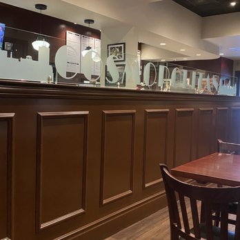 Cosmopolitan Tavern - the bar and seating area - Cocktail Bars Near Me - Fresno, California
