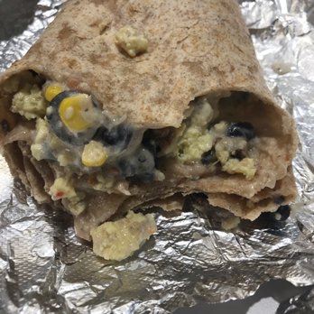 Illegal Pete's Lodo - Breakfast burrito / wheat tortilla / eggs / bacon / veggie chili / cheese / sour cream / corn salsa / black olives / jalapeños - Bars Near Me - Denver, Colorado Illegal Pete's Lodo - Breakfast burrito / wheat tortilla / eggs / bacon / veggie chili / cheese / sour cream / corn salsa / black olives / jalapeños - Bars Near Me - Denver, Colorado