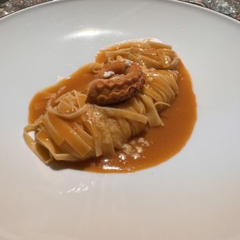 Jamantè - Pasta in octopus sauce, "fake octopus" apparently made of tangerine powder on top - Italian Near Me - Polignano a Mare, BA