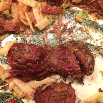 Captain Porky's - Captain Porkys Take-Out Beef Stroganoff. Notice the texture and shape of the outside part of this piece of heart muscle/gizzard. - Seafood Near Me - Wadsworth, Illinois