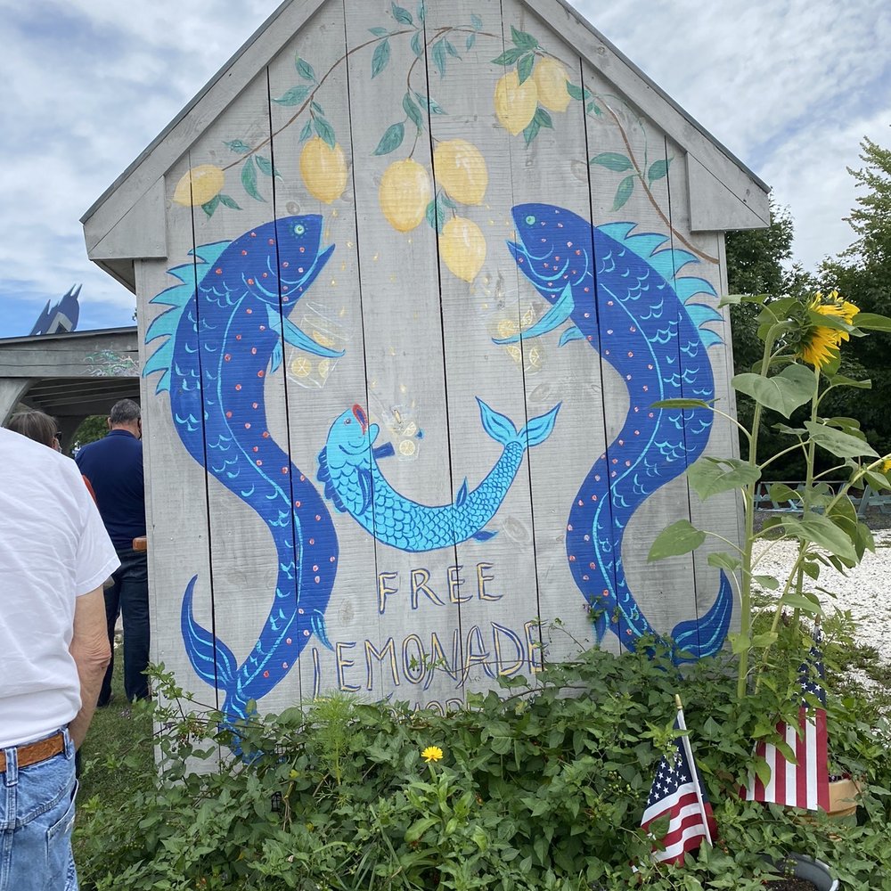Bet's Fish Fry - a man standing in front of a painted barn - Seafood Near Me - Boothbay, Maine Bet's Fish Fry - a man standing in front of a painted barn - Seafood Near Me - Boothbay, Maine