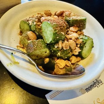Momofuku - Our complimentary appetizer, cucumber with peanuts - New American Near Me - Las Vegas, Nevada