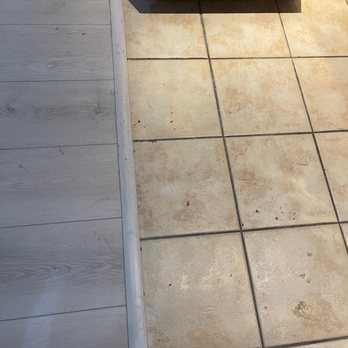 Texas Elite Flooring - Misaligned T-mold - Flooring Near Me - Dripping Springs, Texas Texas Elite Flooring - Misaligned T-mold - Flooring Near Me - Dripping Springs, Texas