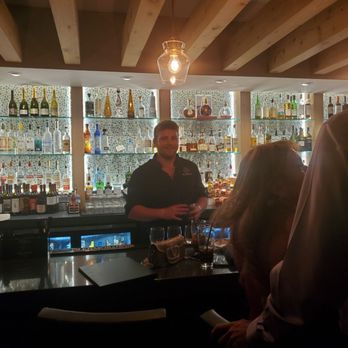 Refinery Jax Beach - Our waiter fixing drinks - Bars Near Me - Jacksonville Beach, Florida Refinery Jax Beach - Our waiter fixing drinks - Bars Near Me - Jacksonville Beach, Florida
