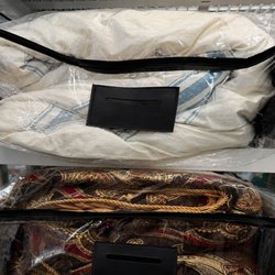 European Cleaners - Cleaned comforters packaged in comforter bags to keep them dust free for storage or transportation