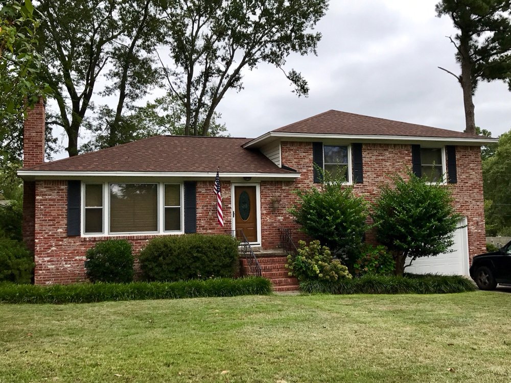 Slide of The Red Shirt Guys Roofing