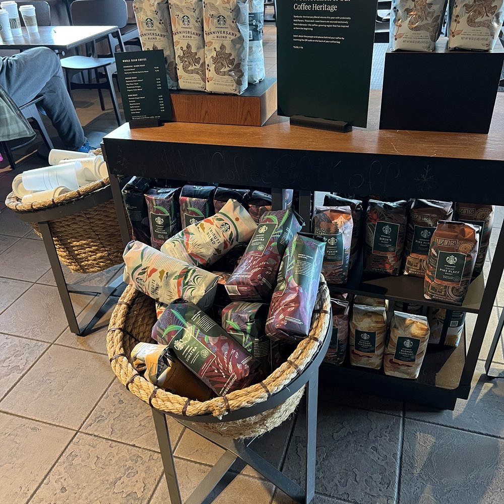 Starbucks - a display of coffee bags in a coffee shop - Coffee & Tea Near Me - Florissant, Missouri Starbucks - a display of coffee bags in a coffee shop - Coffee & Tea Near Me - Florissant, Missouri