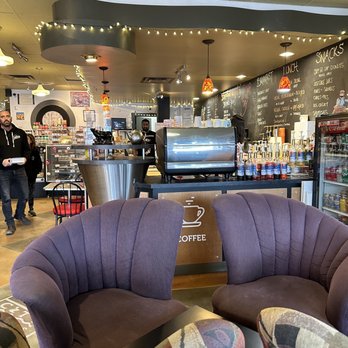 Sippchai Cafe - two purple chairs in a coffee shop - Cafes Near Me - Abbotsford, British Columbia
