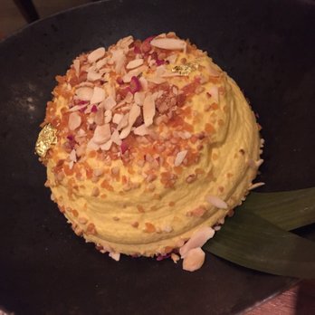 Indian Accent - Makhan Malai, Saffron Milk, Rose Petal Jaggery Brittle, Almonds  It is nothing but flavorful foam but oh soo good with the toppings! - Indian Near Me - New York, New York