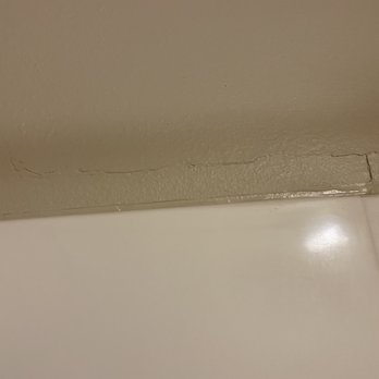 Woodspring Suites - Broke wall that was painted over. - Hotels Near Me - Manassas, Virginia