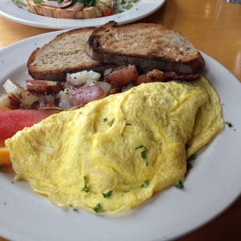 Wild Wheat - Portabella, onion, and cheddar omelet with rye toast! - Breakfast & Brunch Near Me - Kent, Washington Wild Wheat - Portabella, onion, and cheddar omelet with rye toast! - Breakfast & Brunch Near Me - Kent, Washington