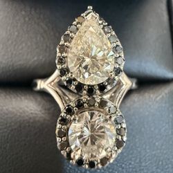 Swindle's Jewelry - They used a .5 & .75 carat diamond, white gold with black diamond accents.