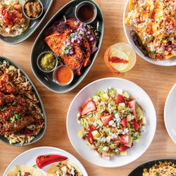 Redbird Scratch Kitchen + Bar - The perfect Redbird spread--loaded wings, smash burgers, elote nachos, margaritas, and more.